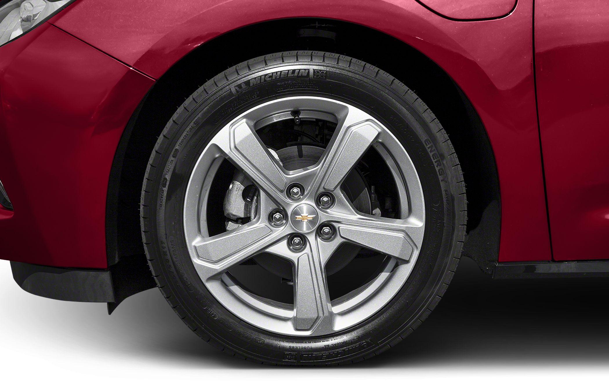 Close-up of alloy wheel and tire on red car