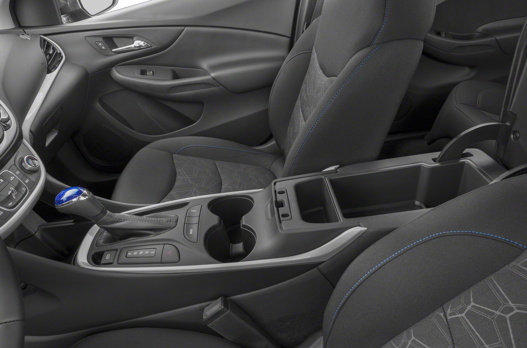 Interior console with gear shift, cup holders, center storage, and detailed seating upholstery