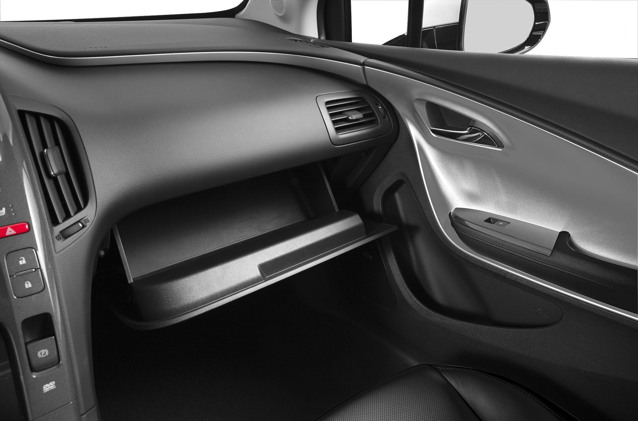 Glove compartment open with dashboard air vents and door panel in view