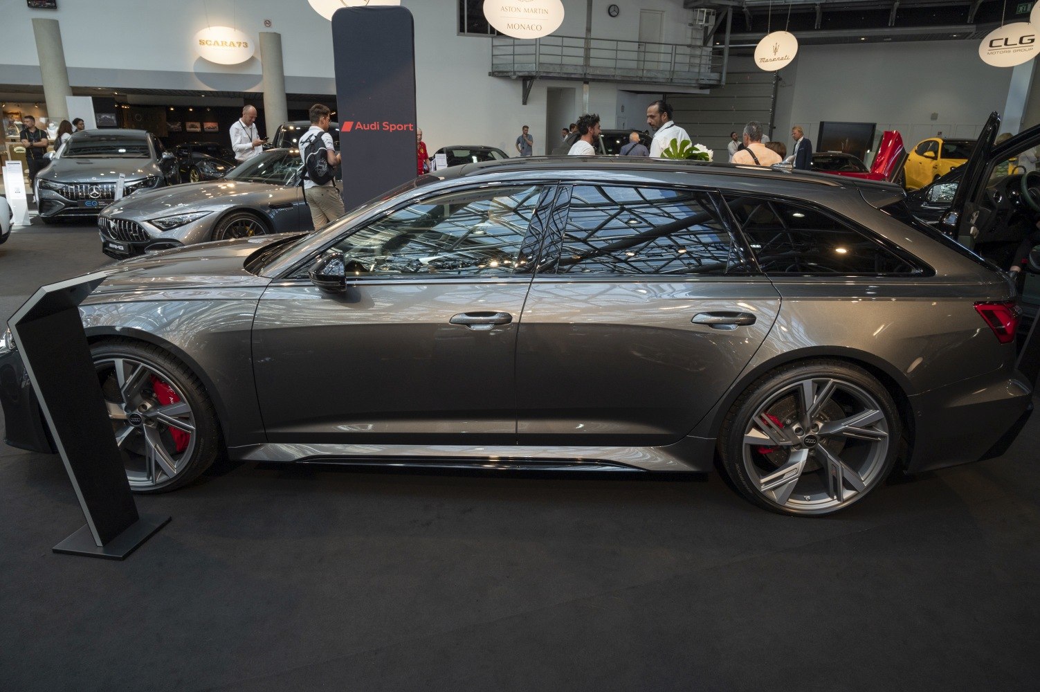 Side profile of sporty estate with alloy wheels and sleek design