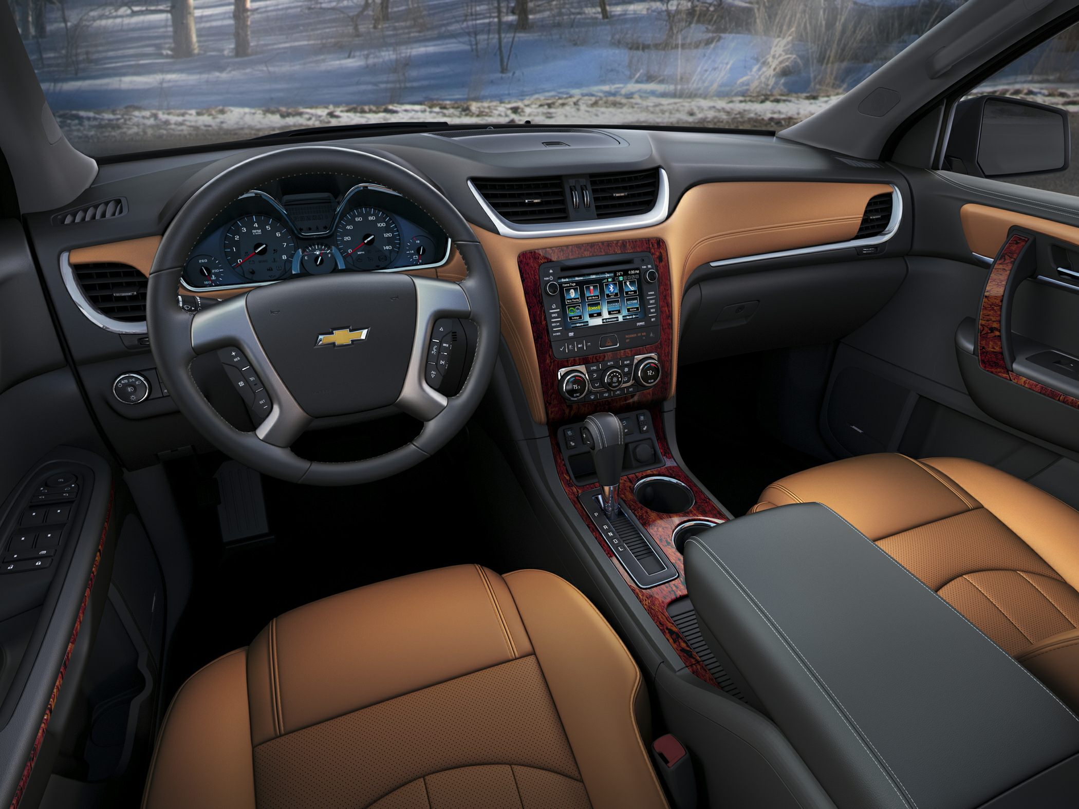Interior with leather seats, dashboard, steering wheel, and infotainment system