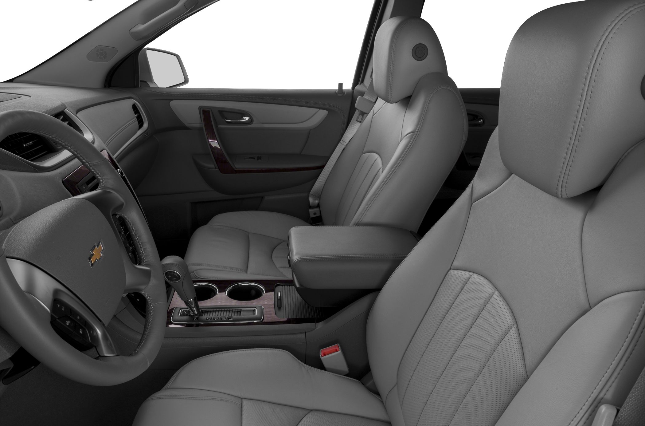 Front seats and dashboard with leather upholstery and wood trim center console