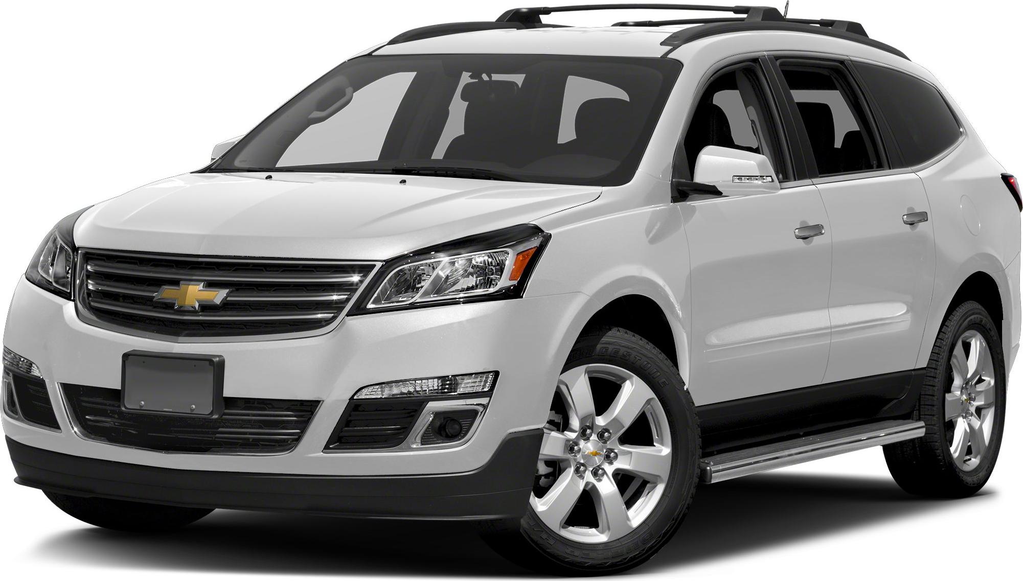 Front right side view with headlight, grille, alloy wheels, and roof rails