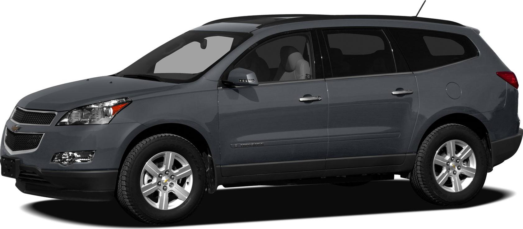 Side profile of a midsize SUV with tinted windows and silver alloy wheels