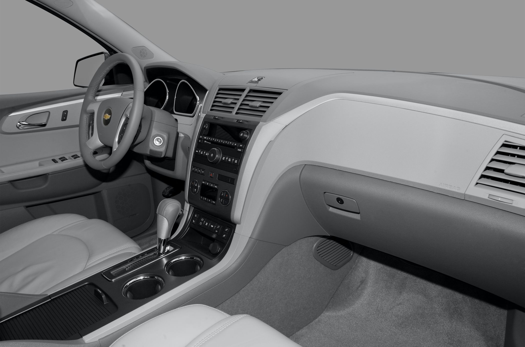 Steering wheel, dashboard, and center console of a vehicle interior