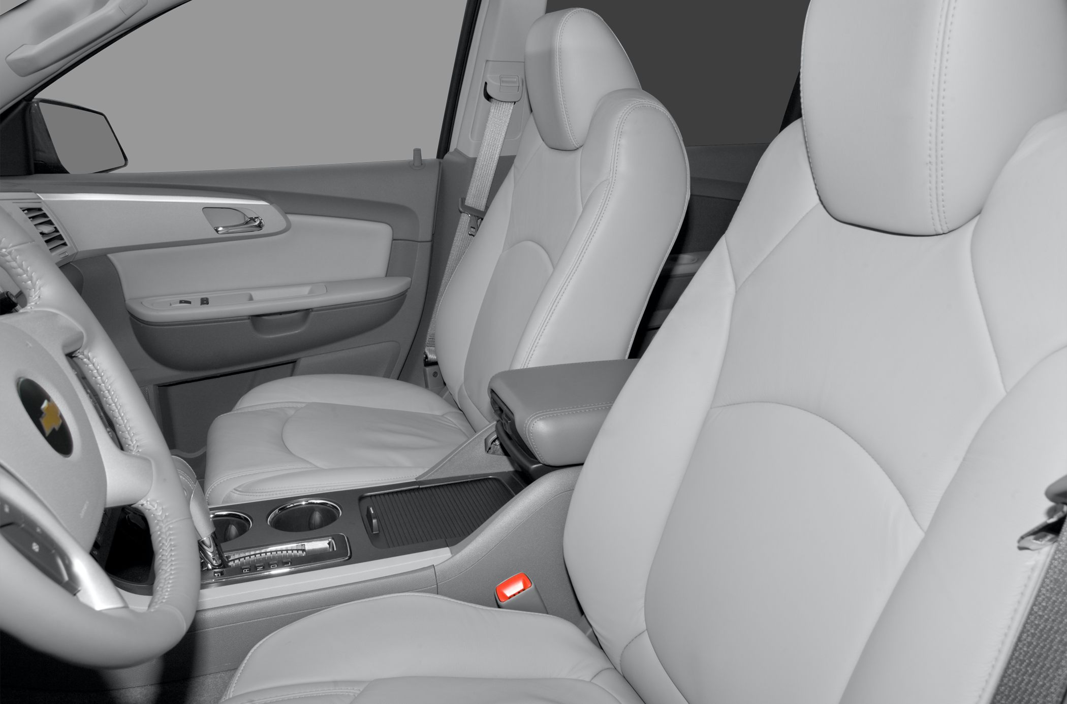 Front seats and center console with cup holders in car interior