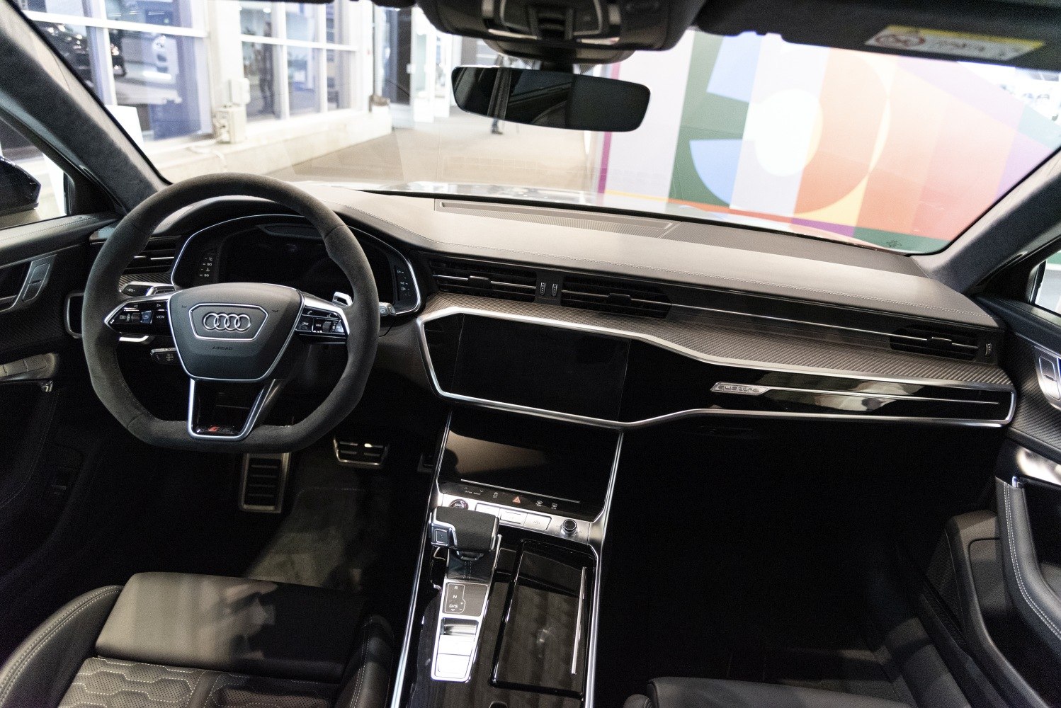 Modern luxury interior with advanced digital dashboard and sleek steering wheel