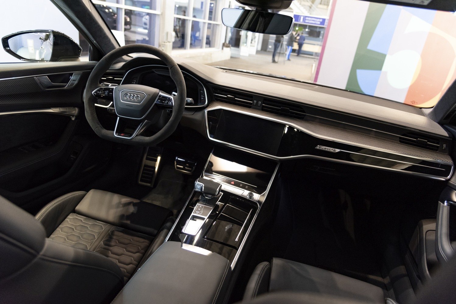 Digital dashboard and multi-function steering wheel in premium car interior