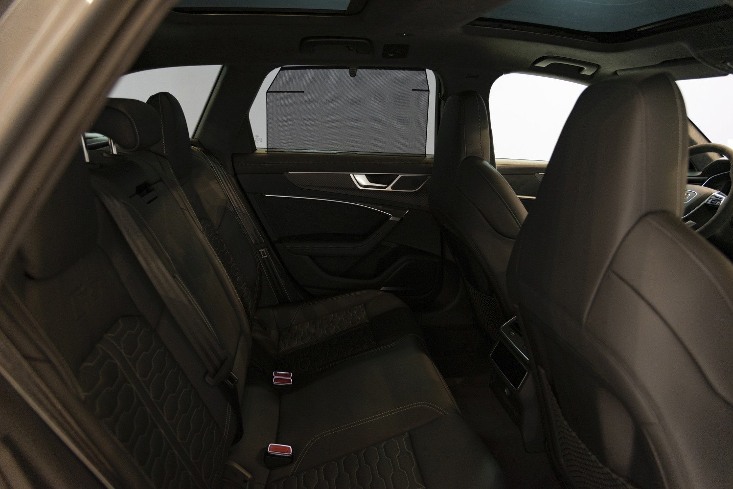 Luxury rear leather seats with stitching and window shade