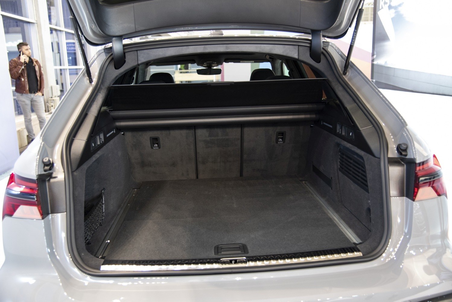 Spacious and organized cargo space with retractable cover