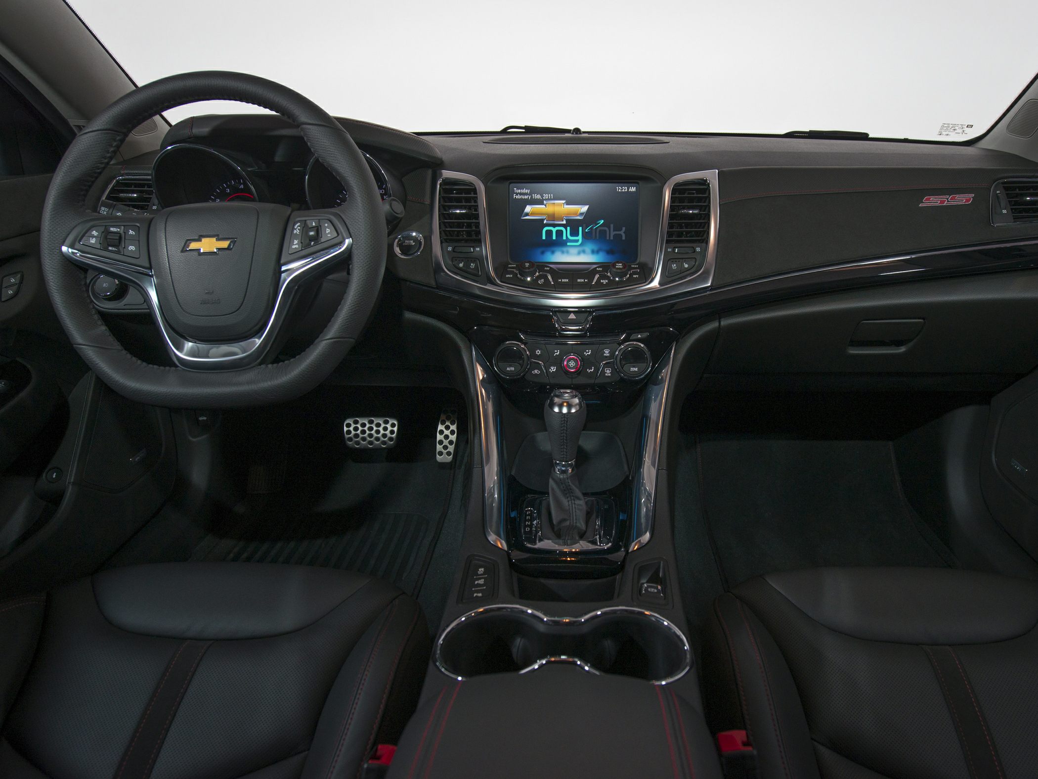 Multifunction steering wheel and touchscreen center console with SS emblem