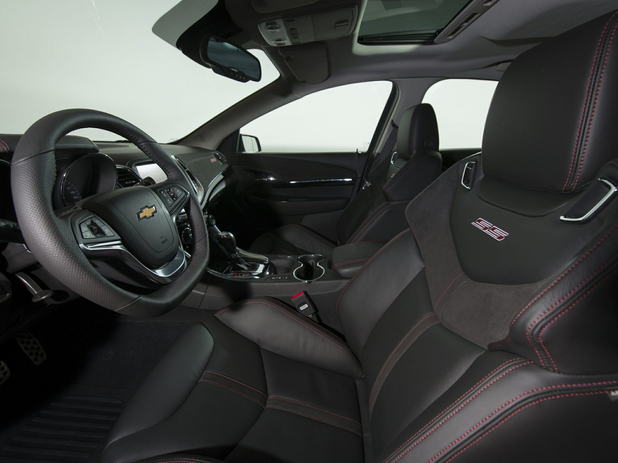 Sport seats with SS logo and steering wheel with controls