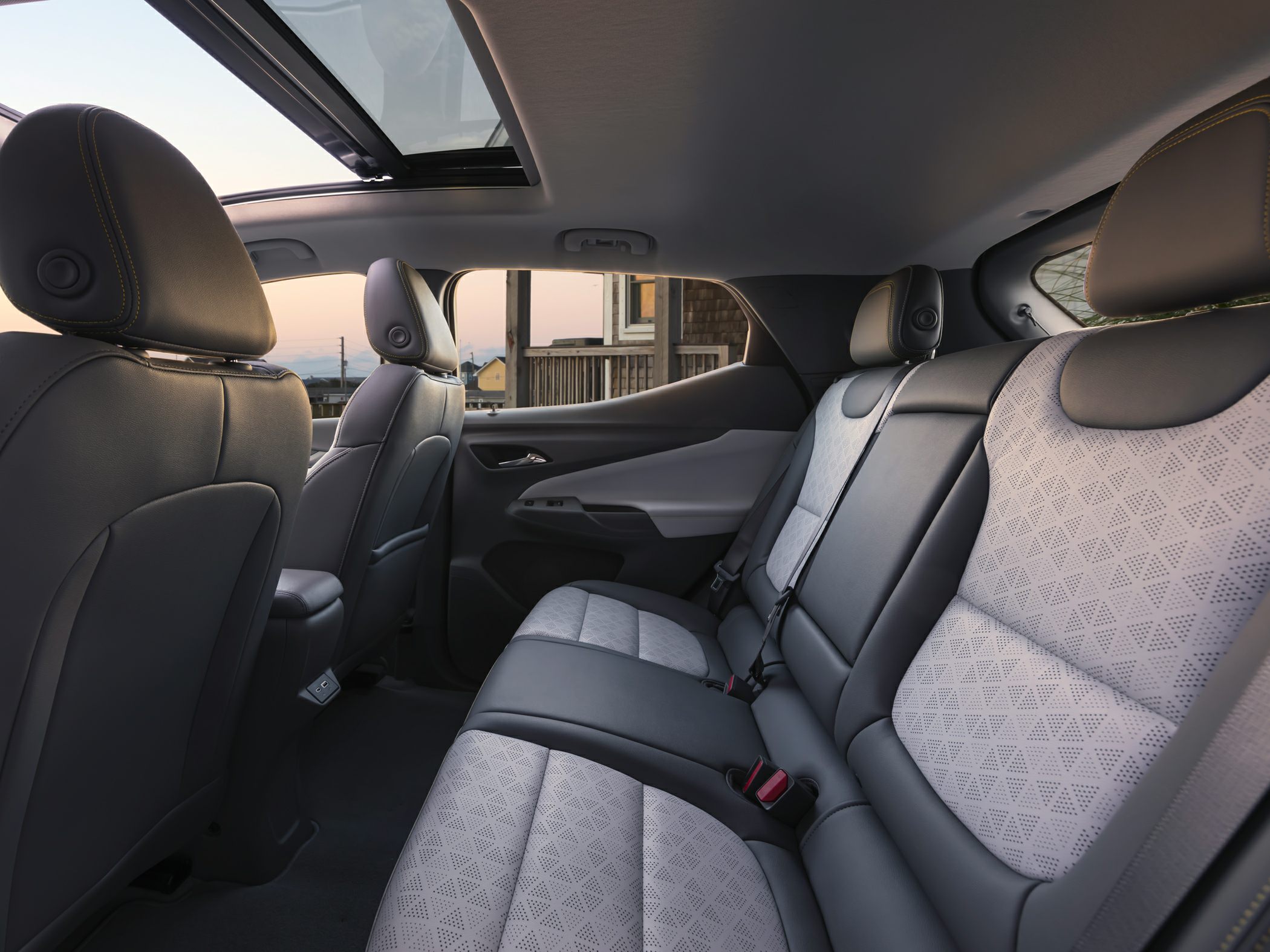 Rear leather seats with patterned upholstery and panoramic sunroof
