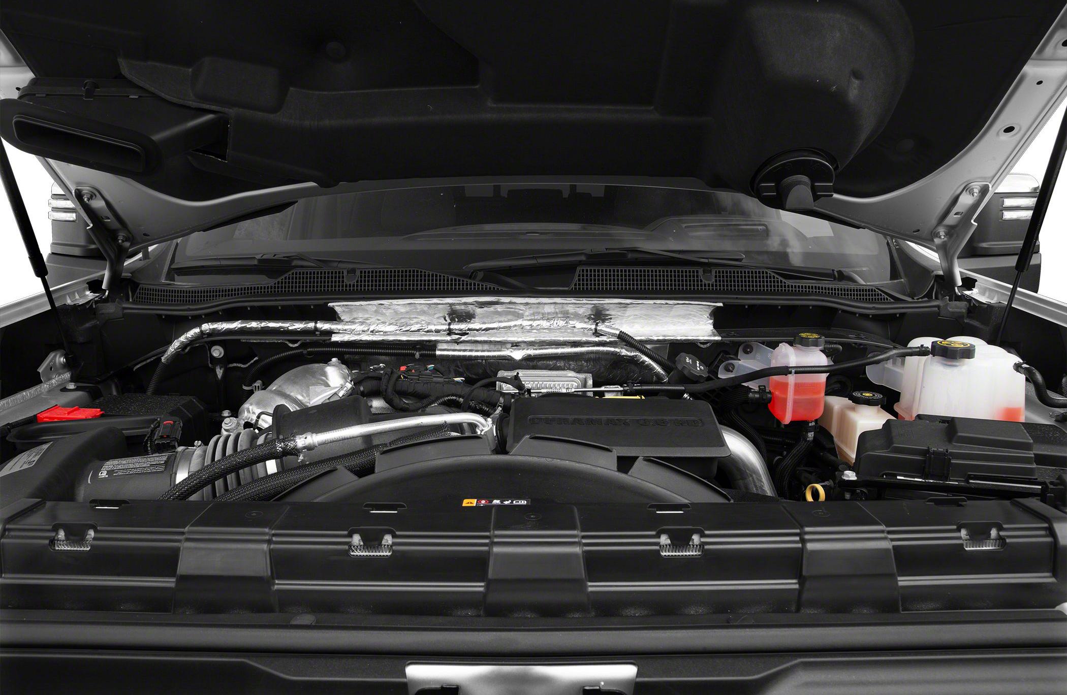 Engine compartment with clean layout and visible fluid reservoirs