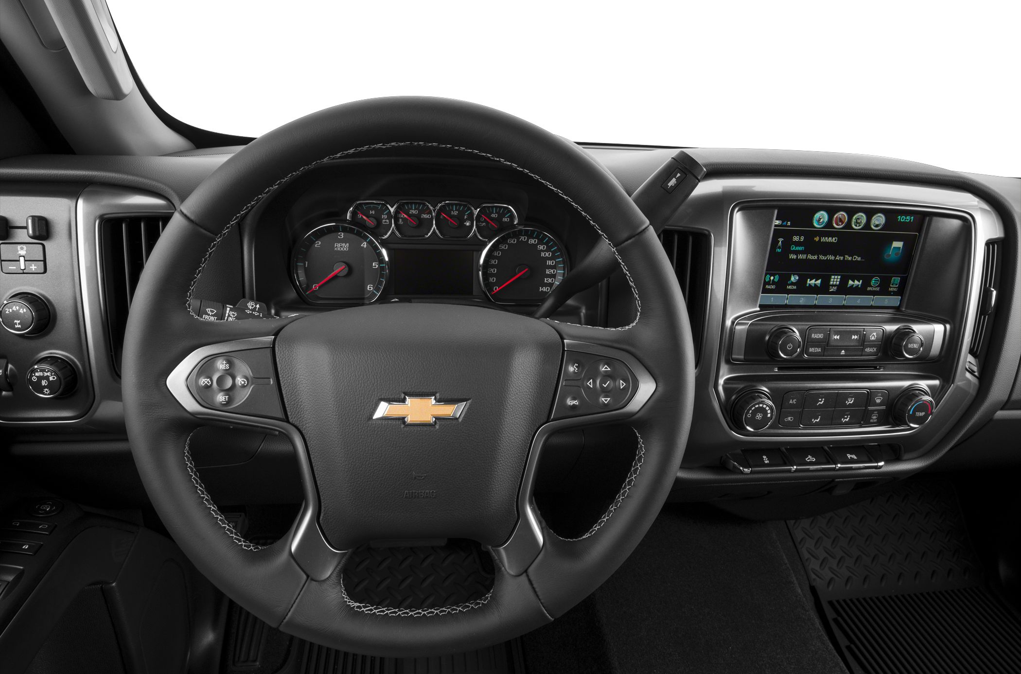 Steering wheel and dashboard with instrument cluster and infotainment system.