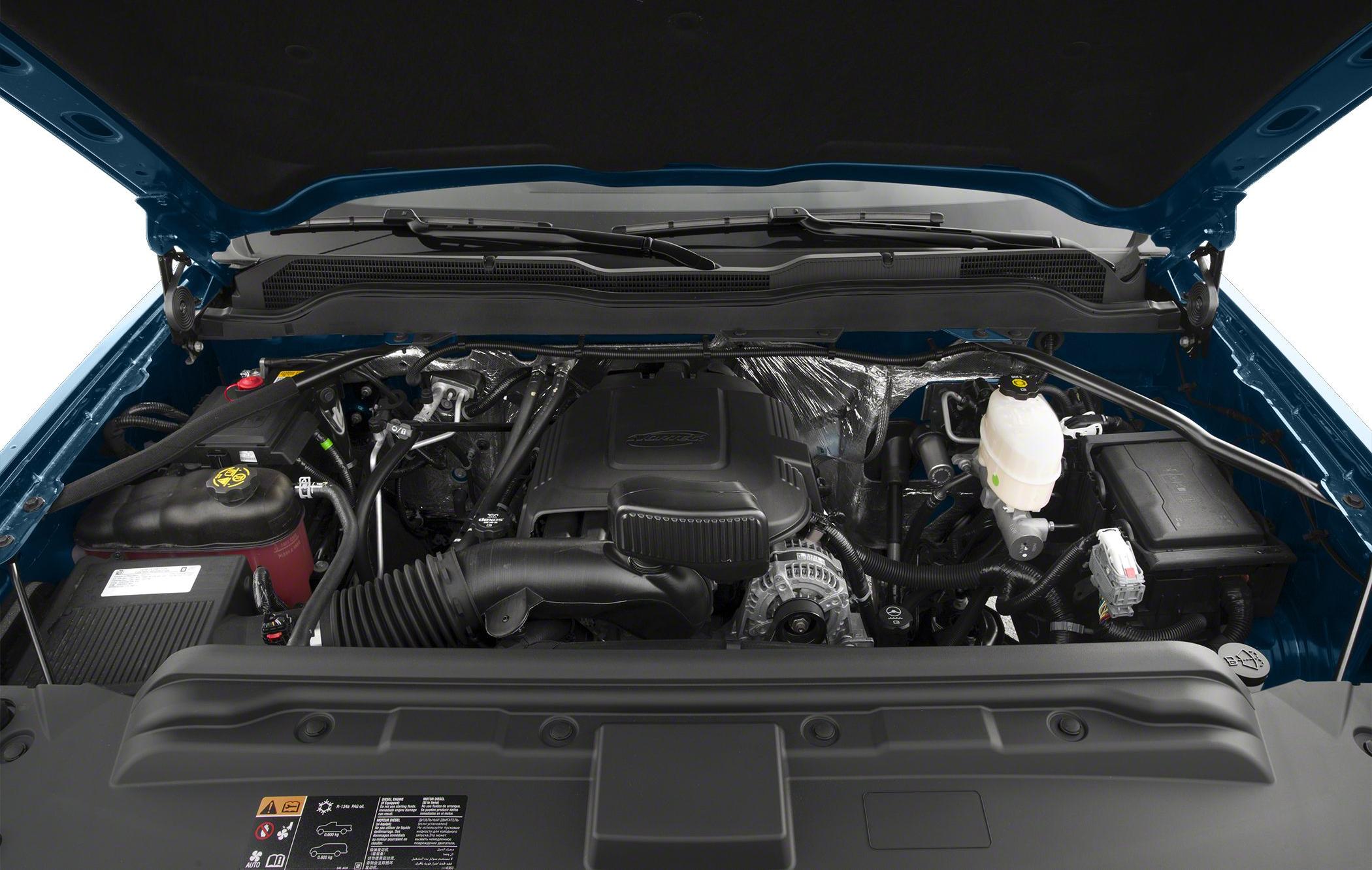 Engine bay with air intake, alternator, and brake fluid reservoir