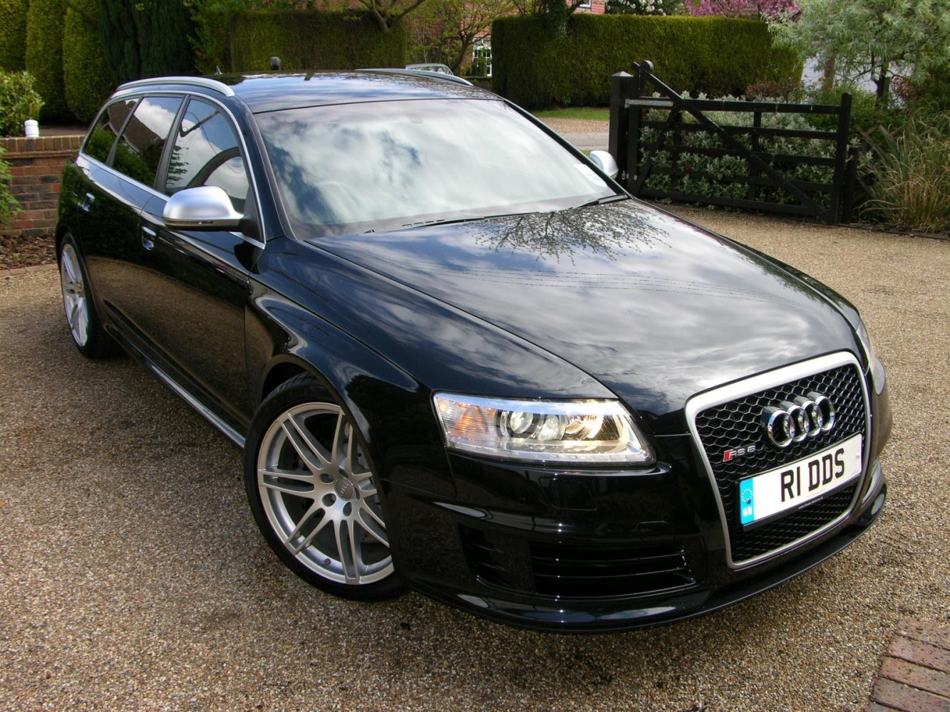 Black high-performance station wagon with LED headlights and stylish alloy wheels