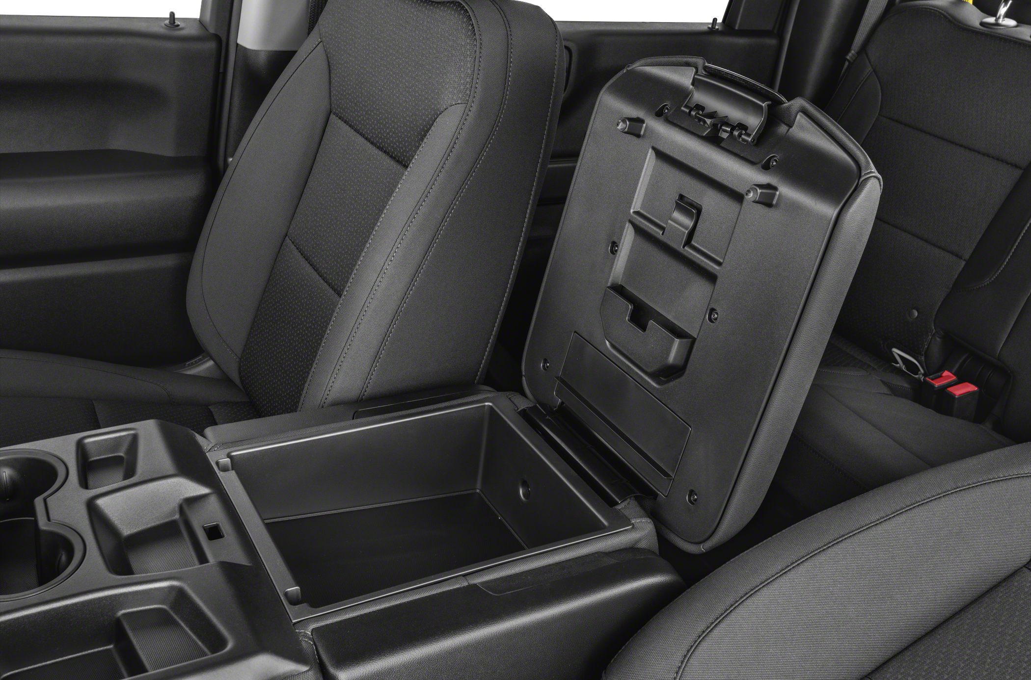 Open center console storage compartment in truck interior