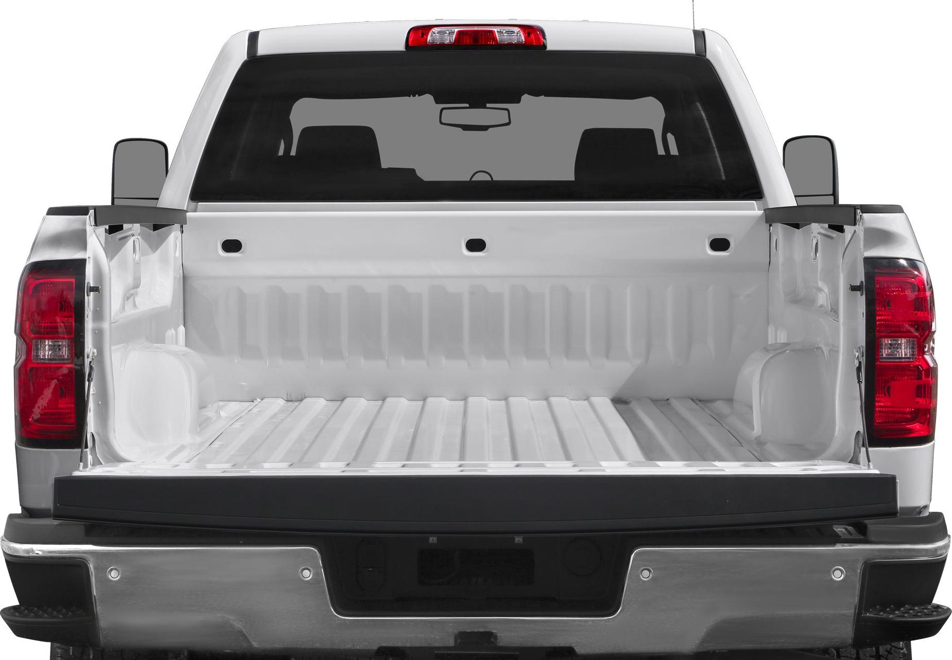 Open pickup tailgate with spacious cargo bed and step bumper.