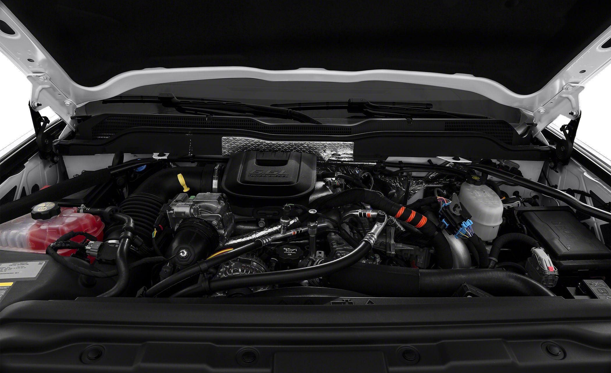 6.6L Duramax diesel engine with complex piping and components.