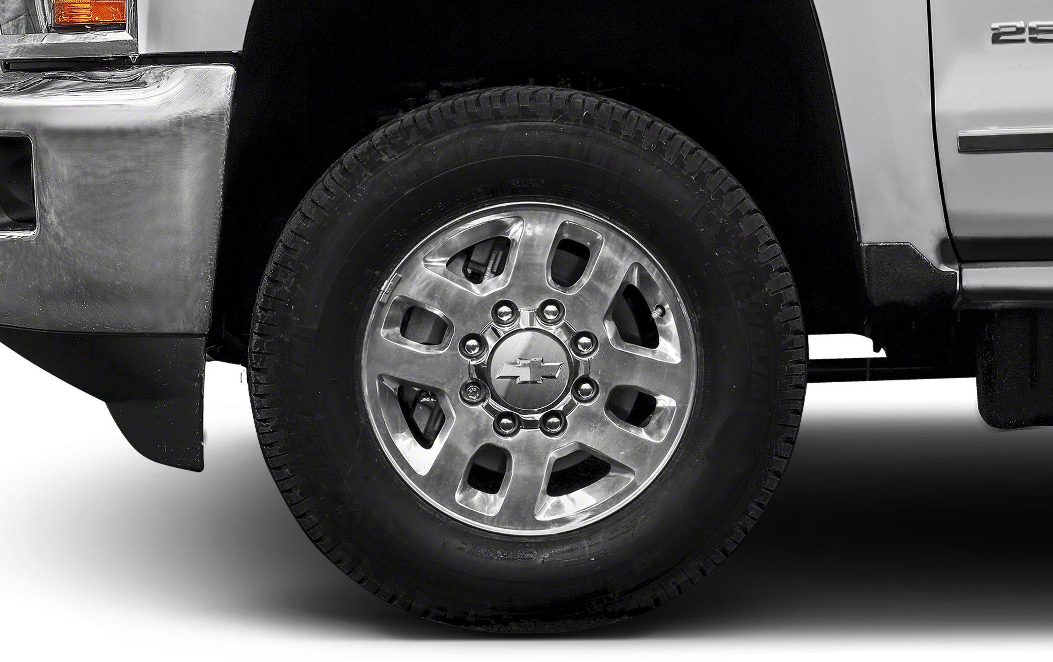 Close-up of alloy wheel and tire on heavy-duty pickup truck