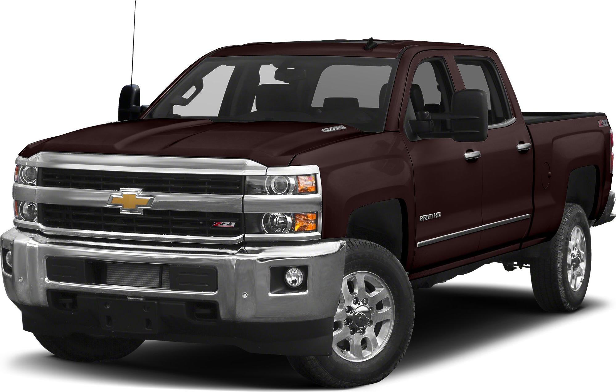 Front and side view of heavy duty pickup with long box and robust grille