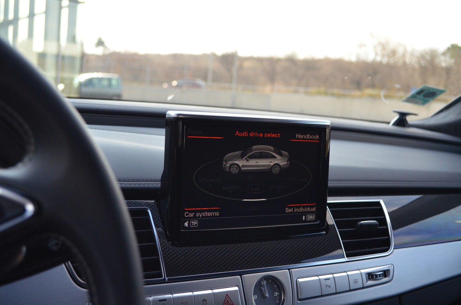 Interior multimedia display with Audi drive select menu and control panel