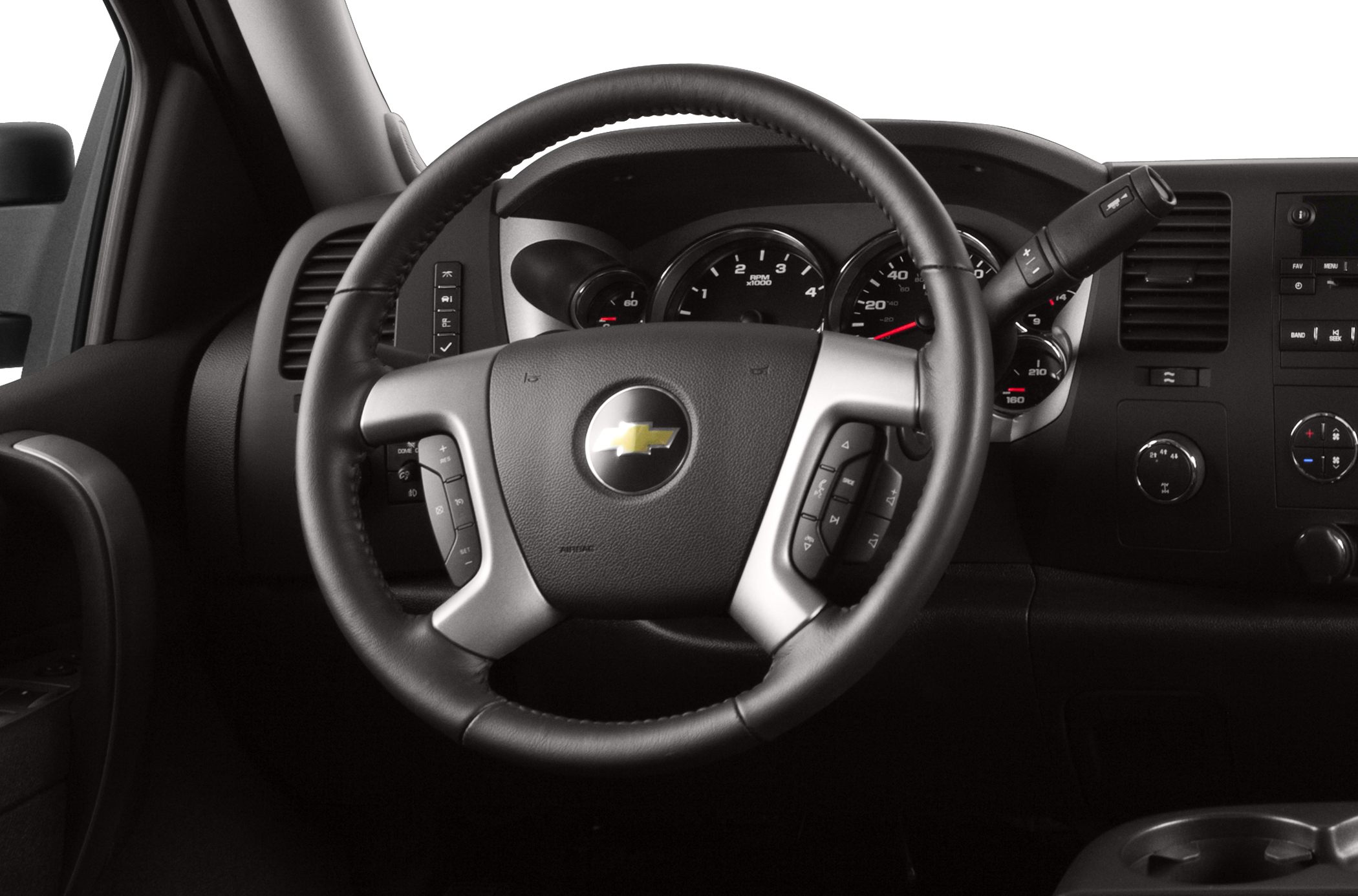 Steering wheel with control buttons and instrument cluster gauges