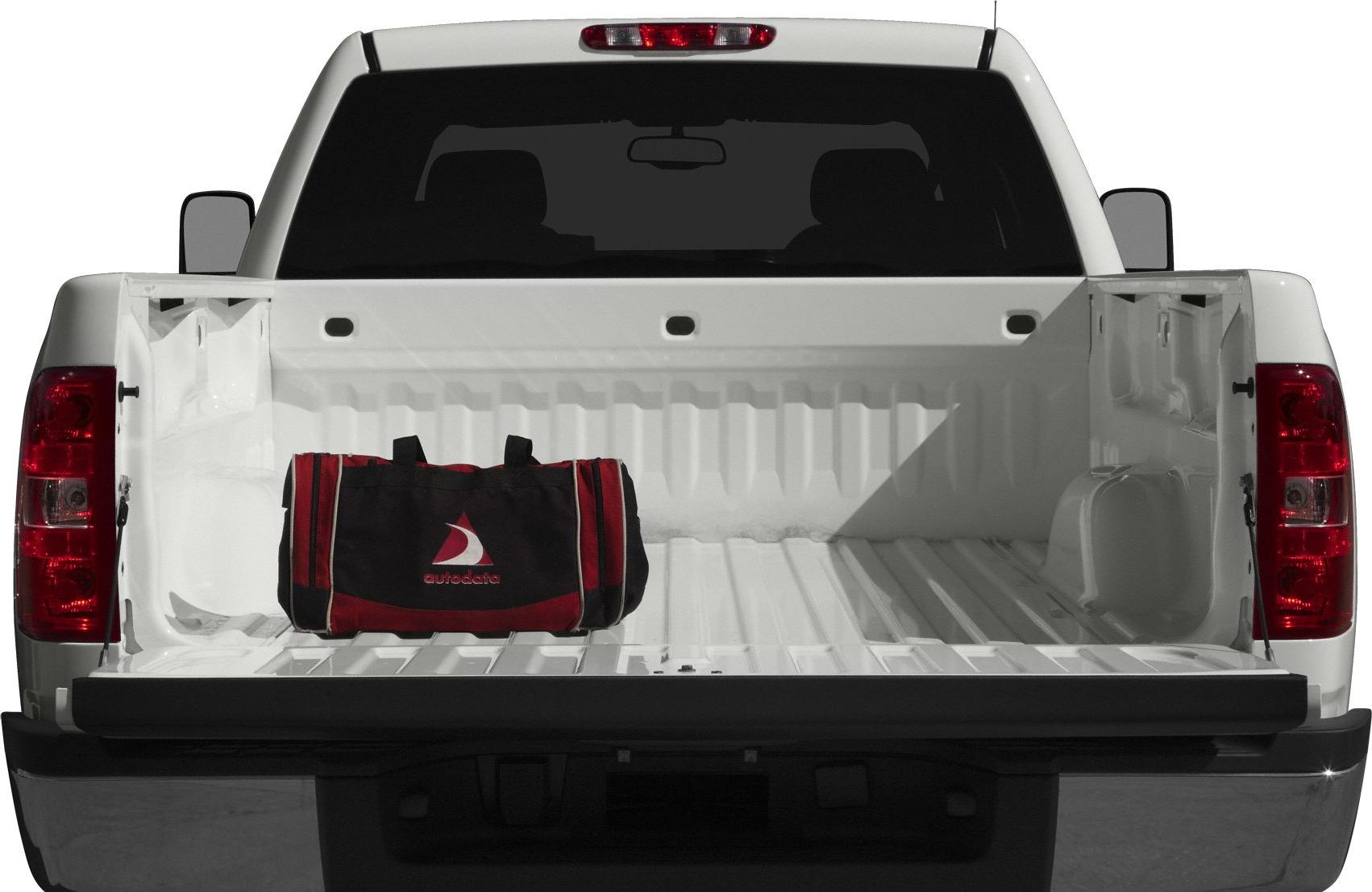 Open truck bed with a red-black bag inside