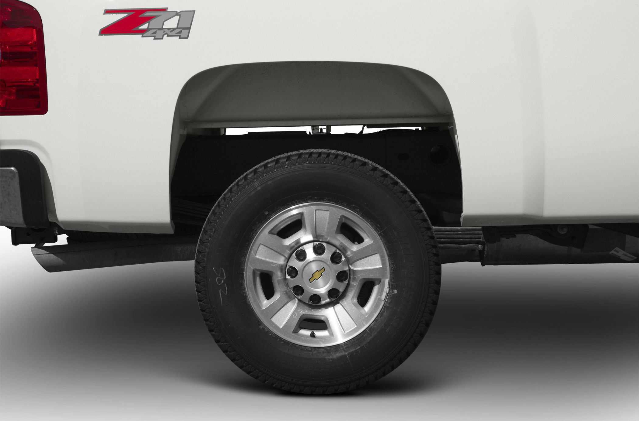Rear wheel with alloy rim and Z71 4x4 badge on pickup truck