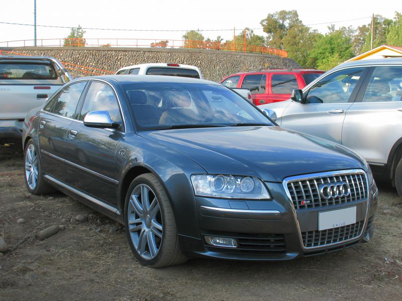 Luxury sedan with distinctive grille and LED headlights front side view
