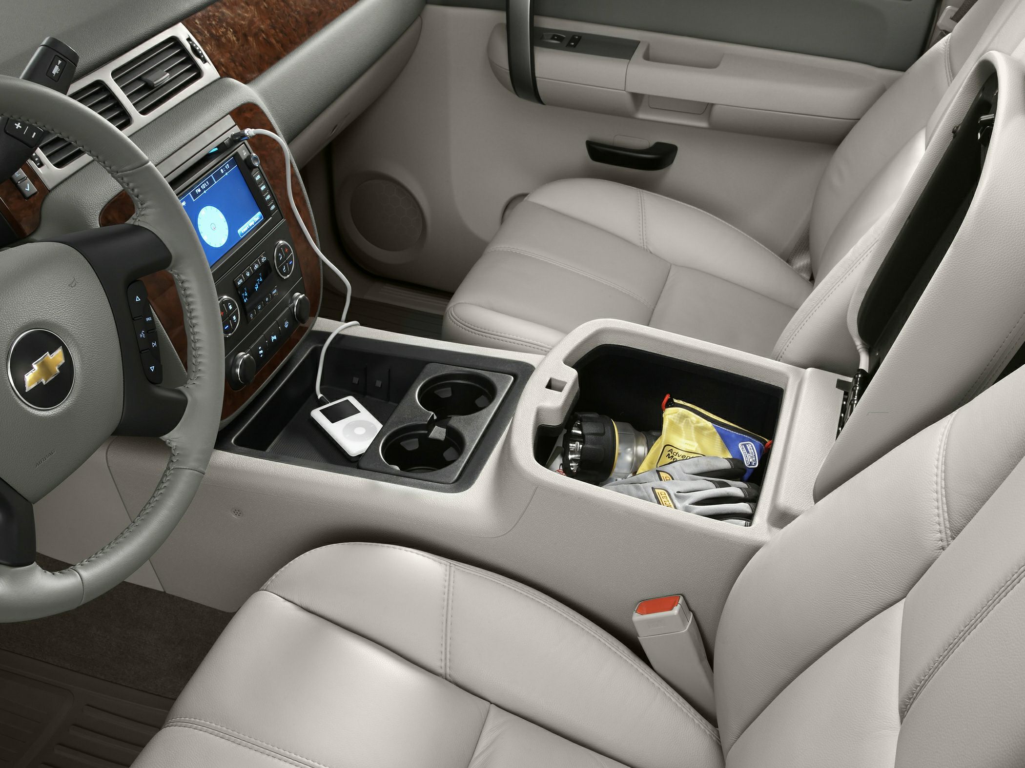 Leather seats and center console with storage and cup holders