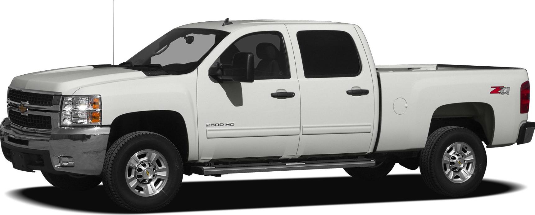 White extended cab pickup with standard box and chrome grille