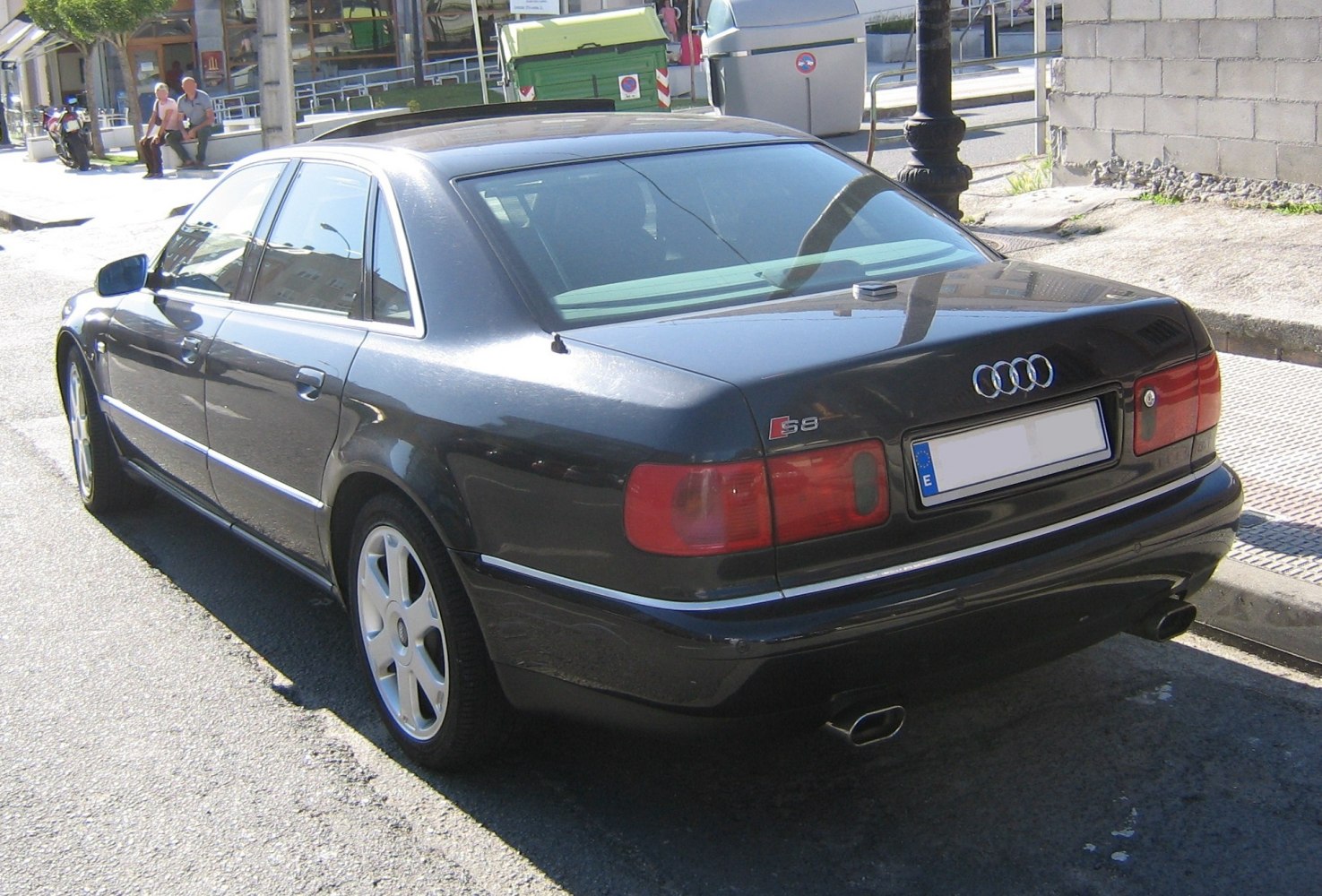 Rear view with dual exhaust and red tail lights