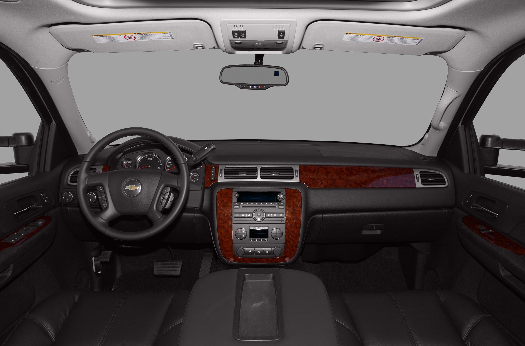 Dashboard, steering wheel, wood trim accents