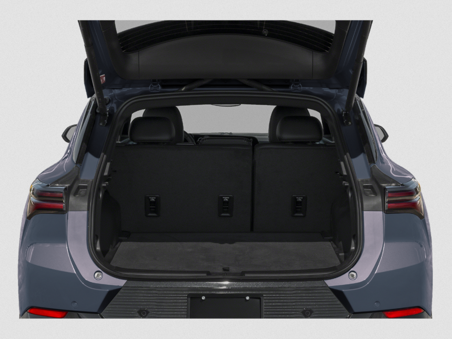 Open rear hatch showing spacious cargo area and folded rear seats