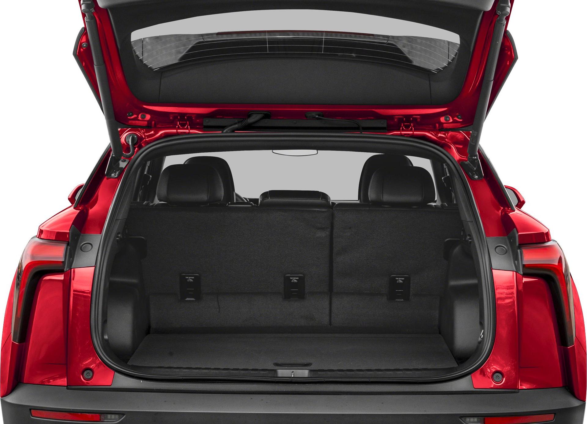 Open rear liftgate showing spacious cargo area and rear seats.