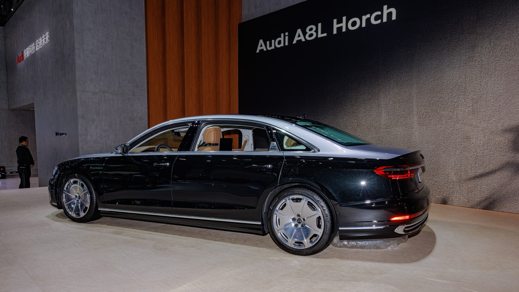 Sleek luxury sedan with two-tone paint and premium wheels