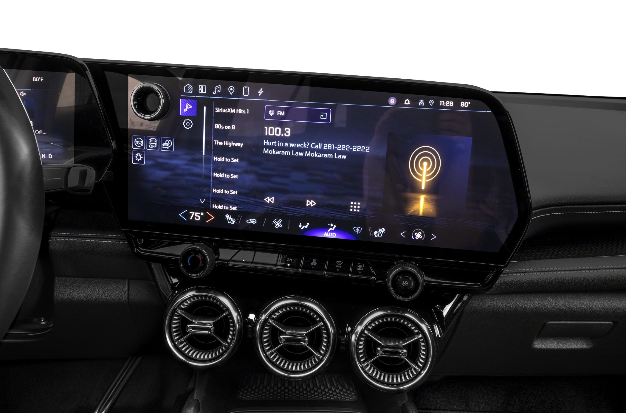 Wide touchscreen infotainment and three round air vents
