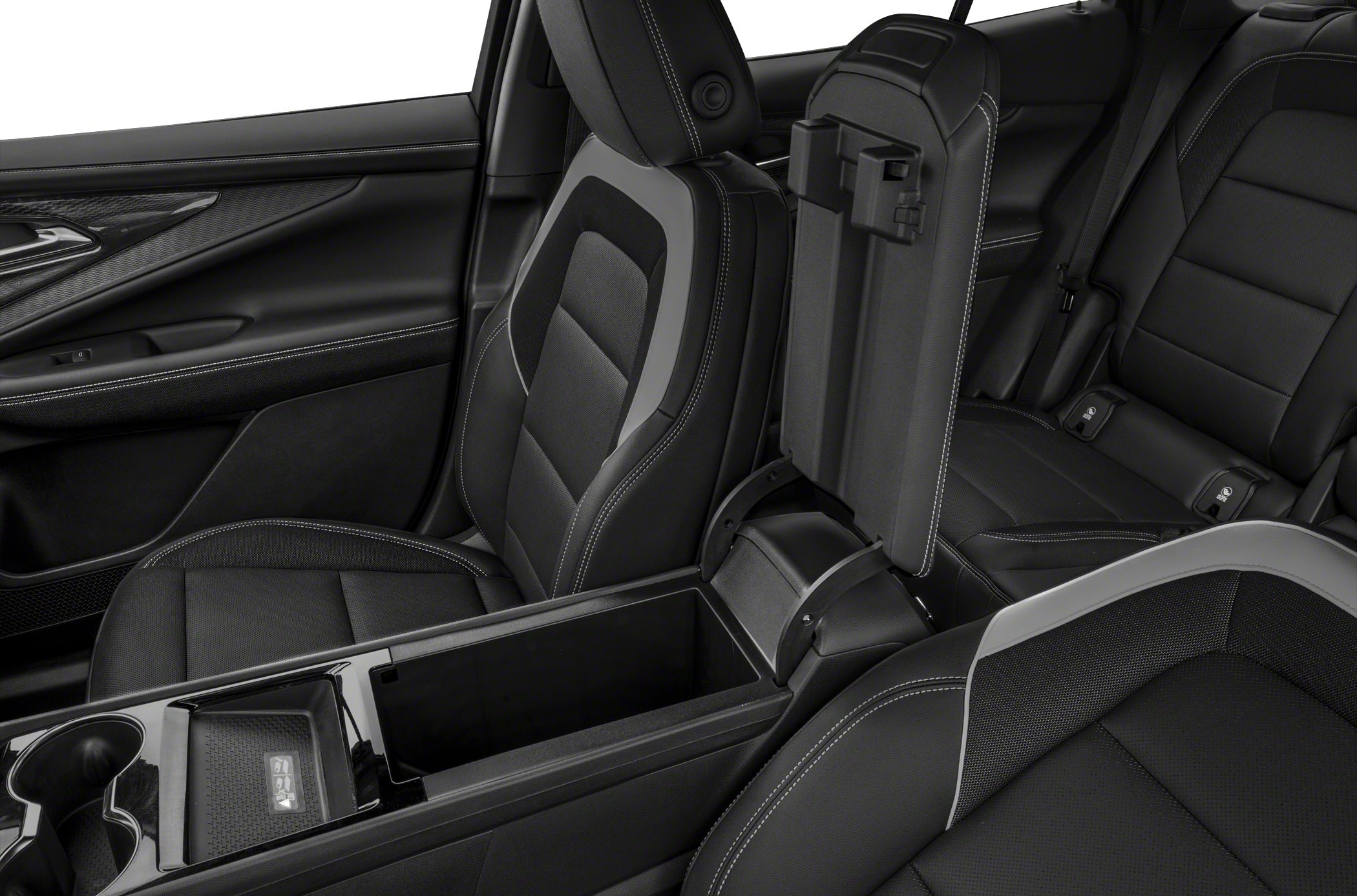 Premium black seats with open center console storage in electric SUV interior