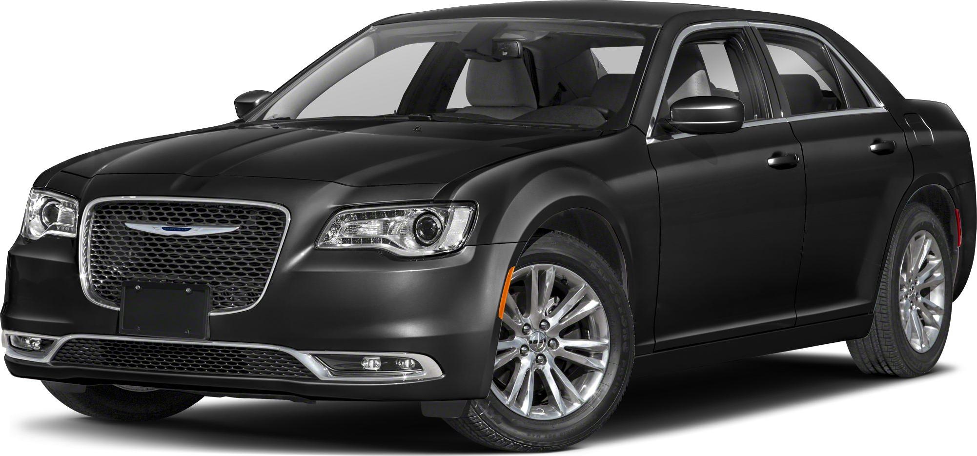 Front angled view with prominent grill and headlights of a black sedan.