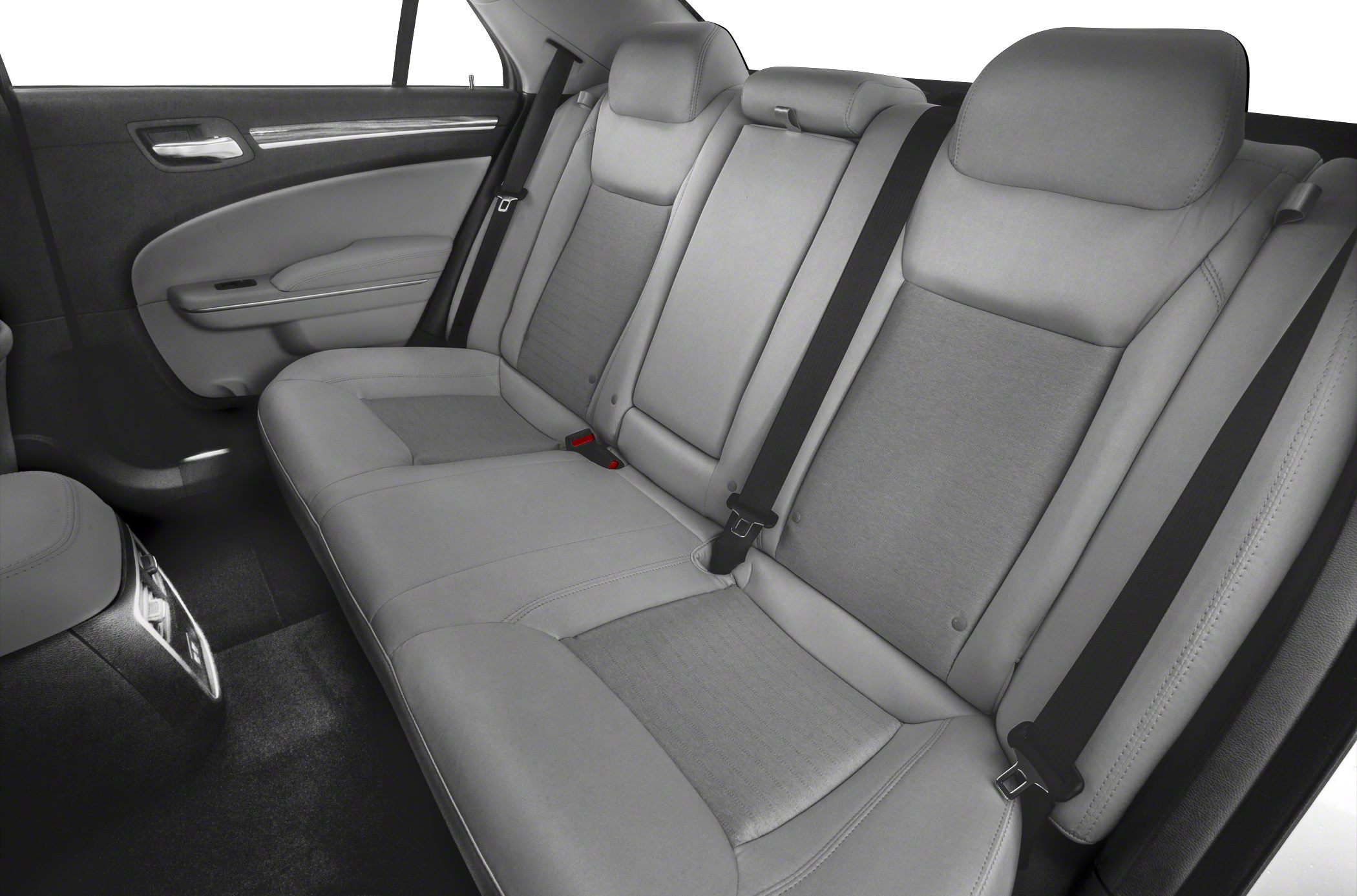 Leather rear seat upholstery with seat belts and door trim