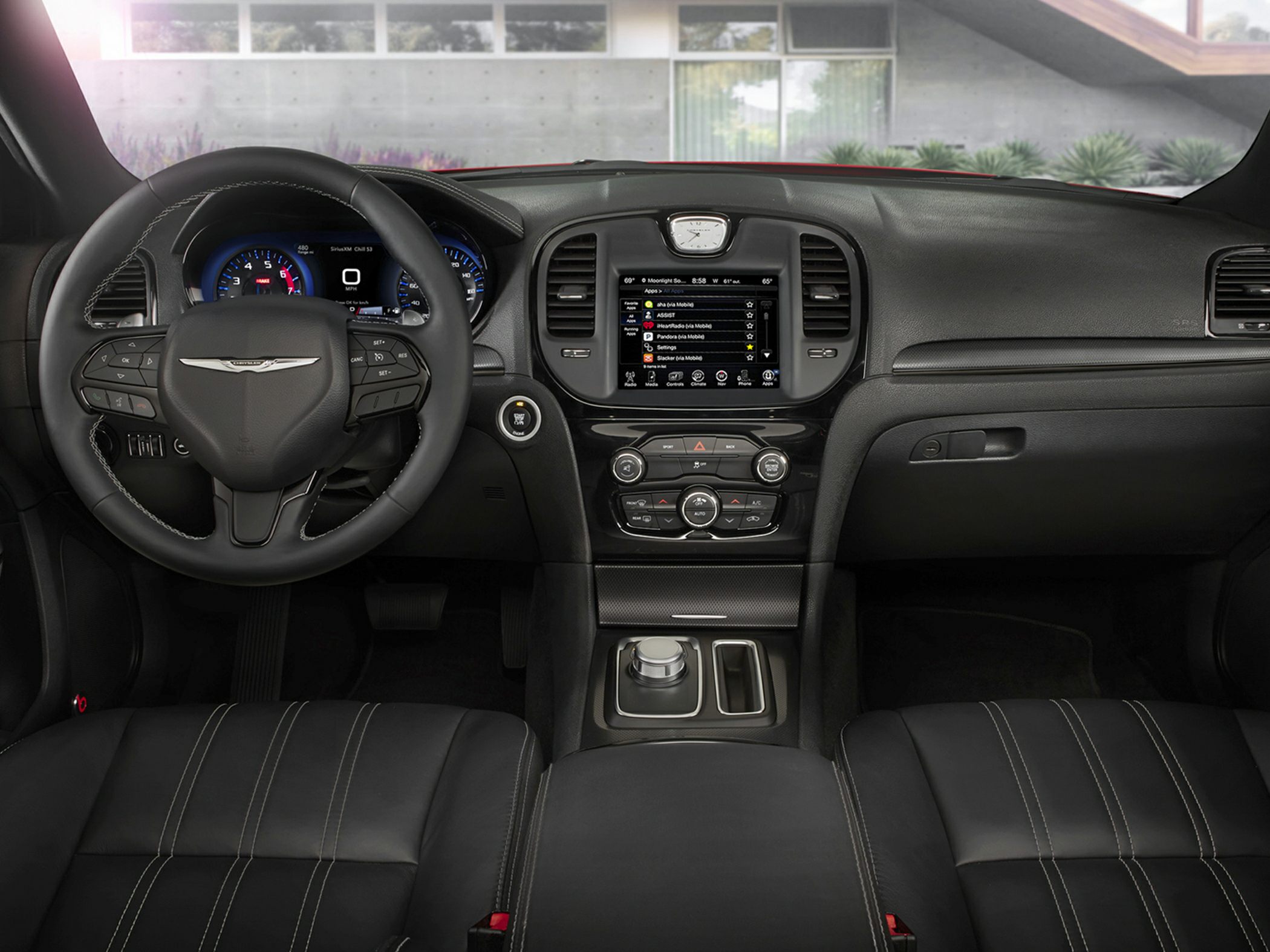 Dashboard with infotainment screen and multifunction steering wheel