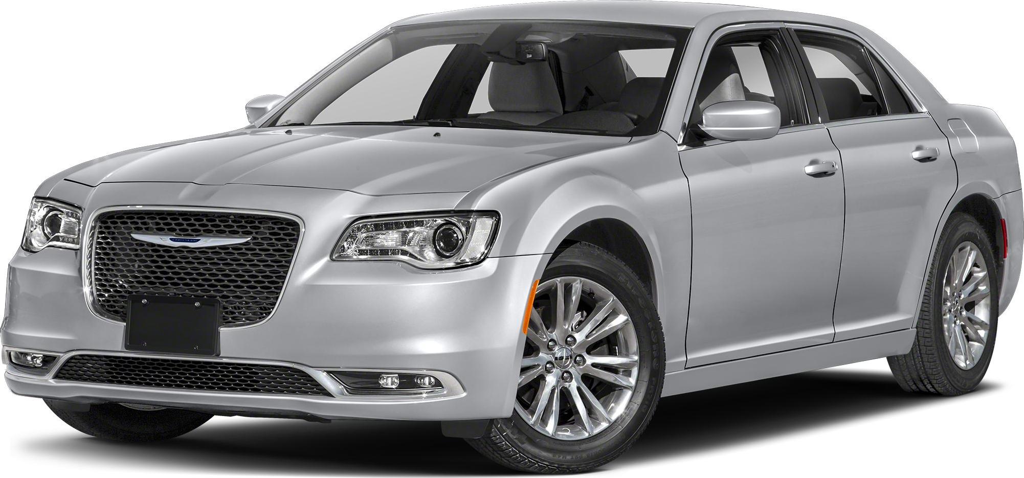 Silver luxury sedan front view with prominent grille and alloy wheels