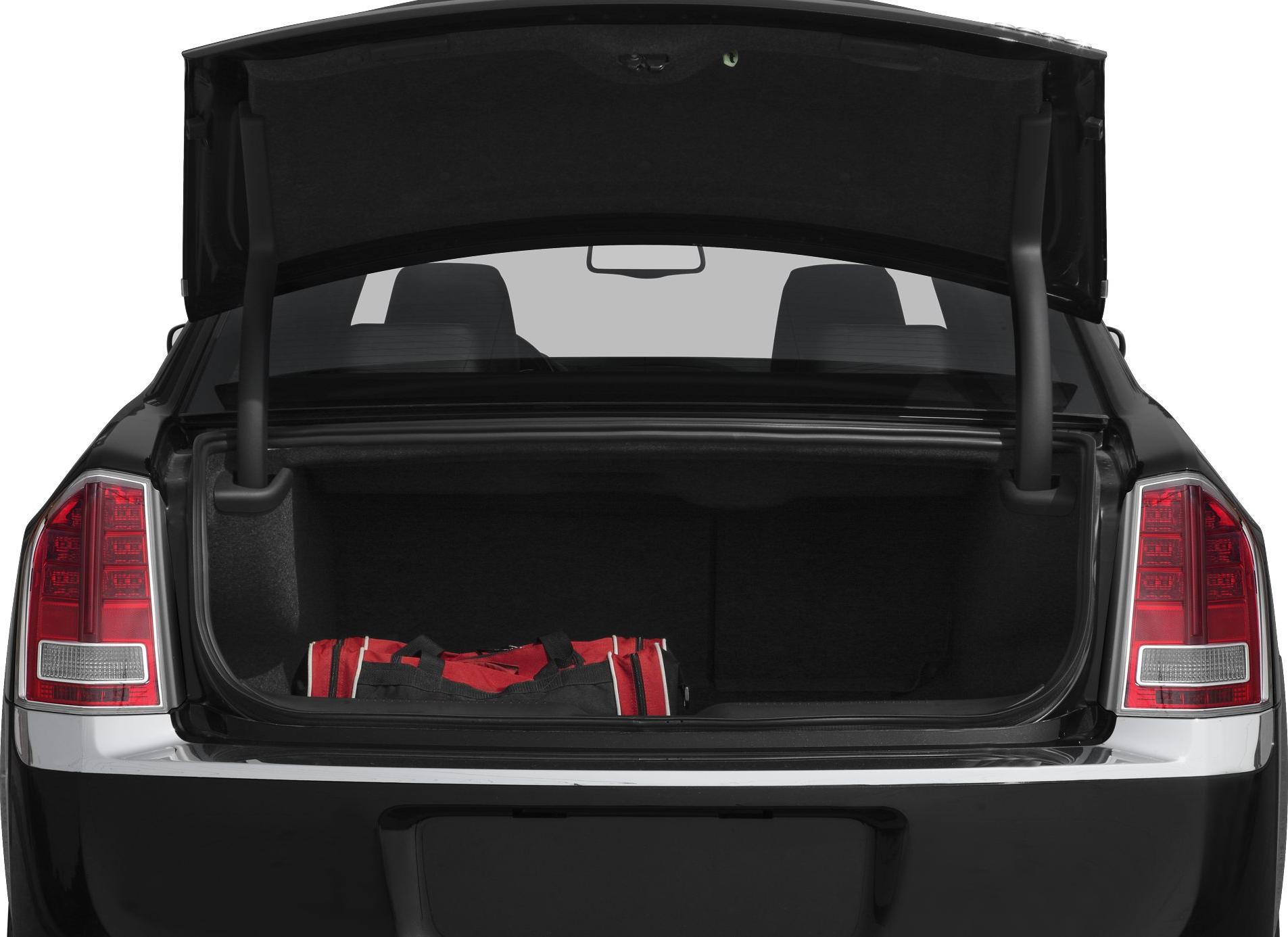 Open trunk with red sports bag and visible rear taillights