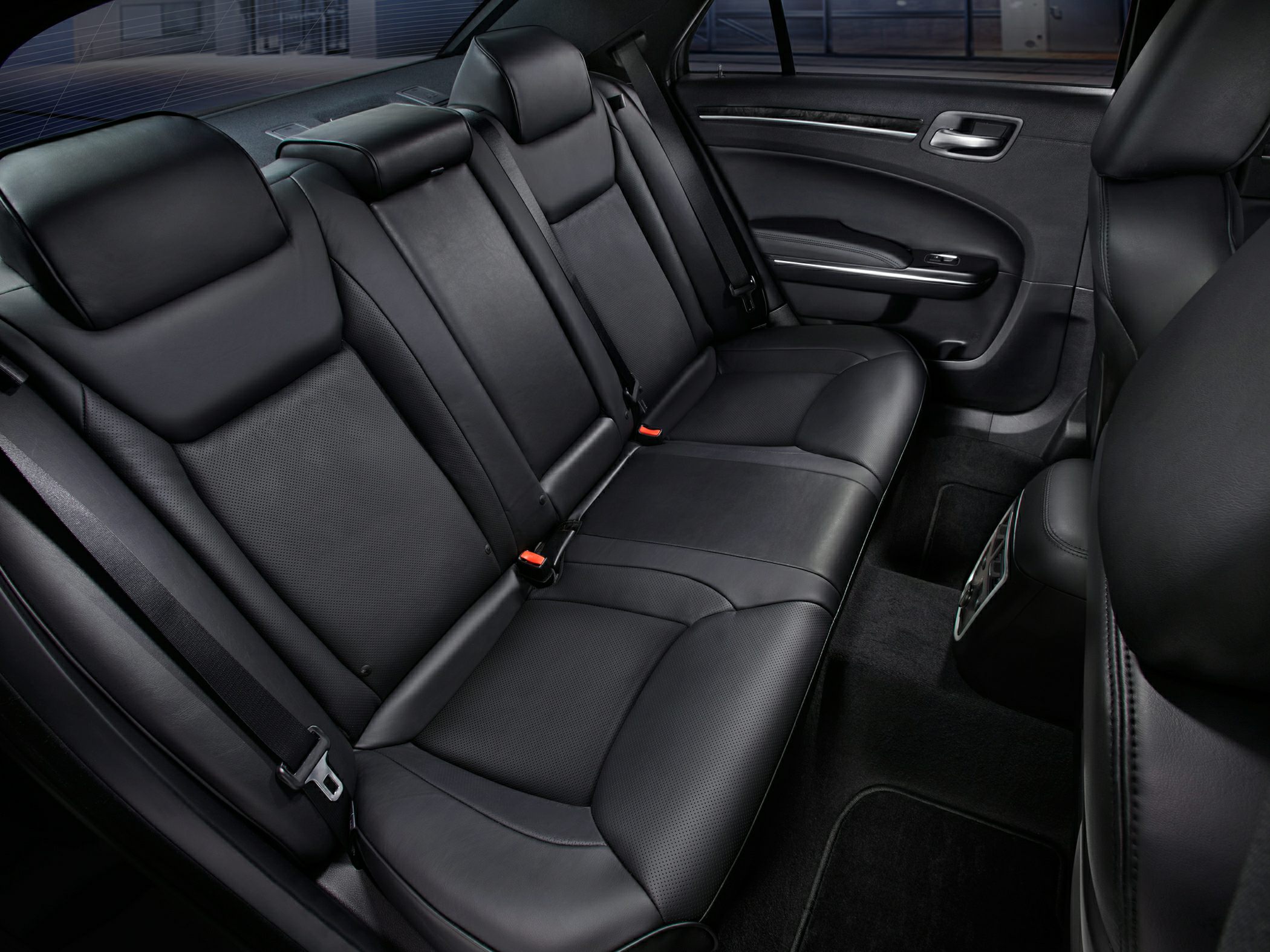 Black leather rear seats with spacious seating and seatbelts