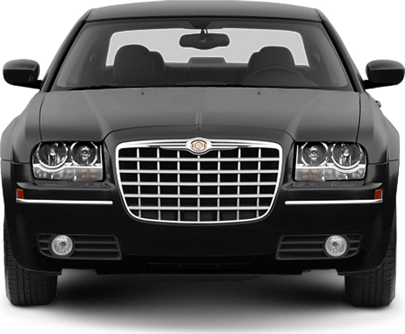 Front view with iconic grille and dual round headlights
