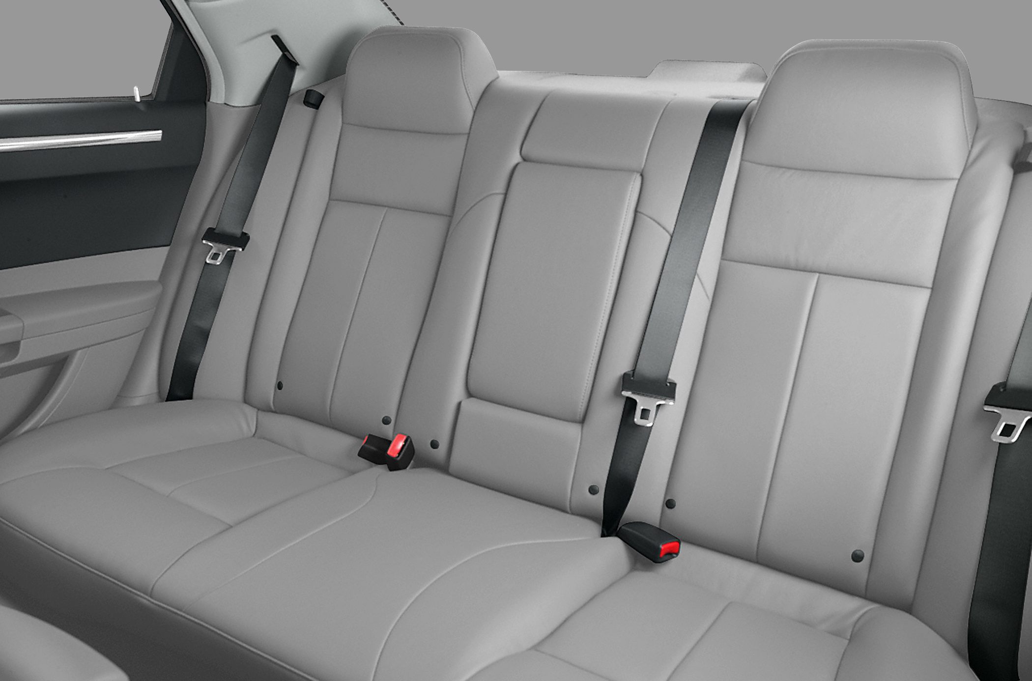 Rear seat with gray leather upholstery and three-point seat belts