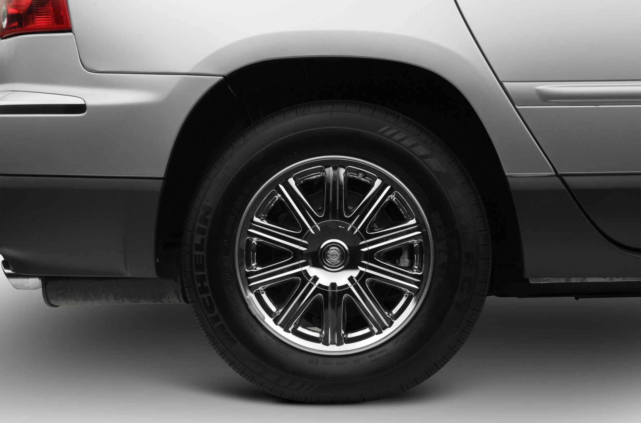 Polished chrome rim and rear fender of crossover wheel