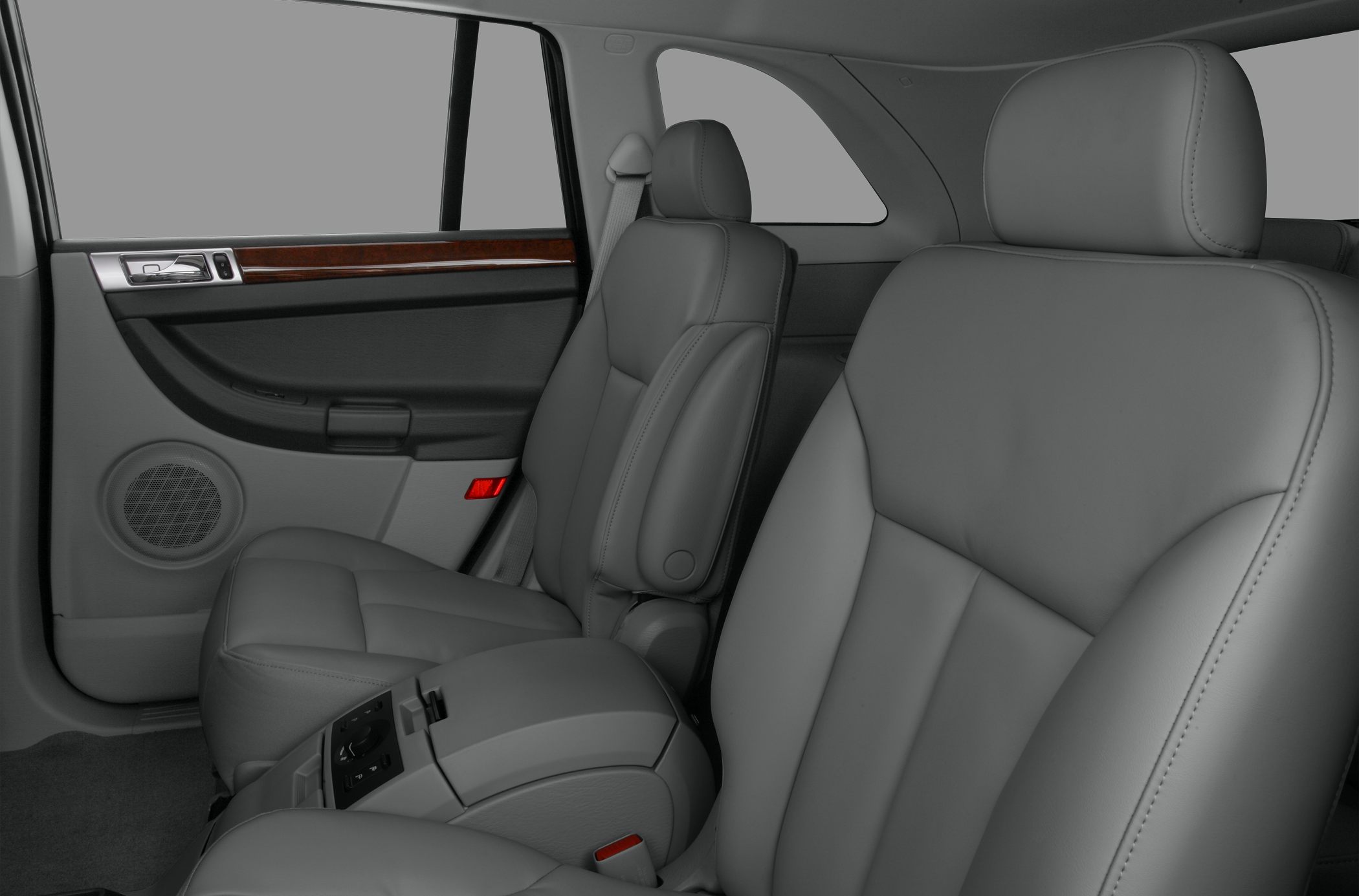 Leather seats and center console in car rear interior